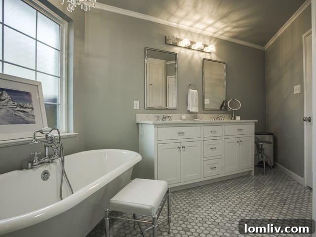 Second view of the master bathroom, highlighting its spa-like amenities and bright design.