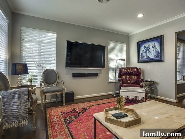 Another view of the spacious living area, emphasizing natural light and classic design.