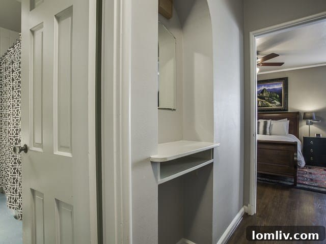 Charming original telephone nook, a delightful detail reflecting the home's 1940s heritage.