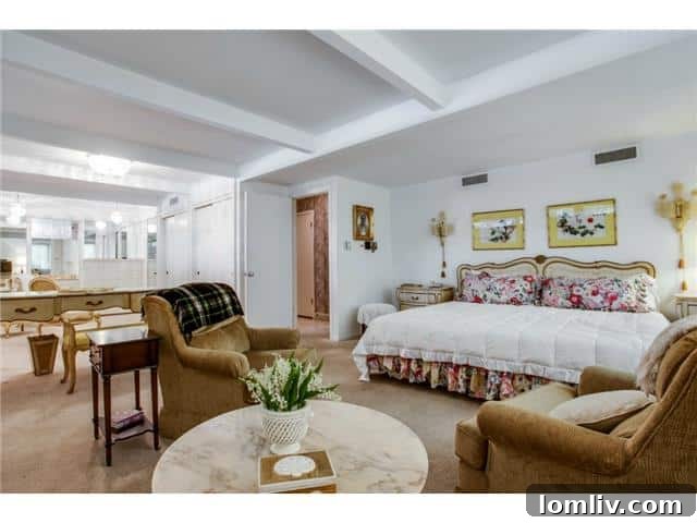 Spacious Master Bedroom with Vintage Accents and Dressing Area