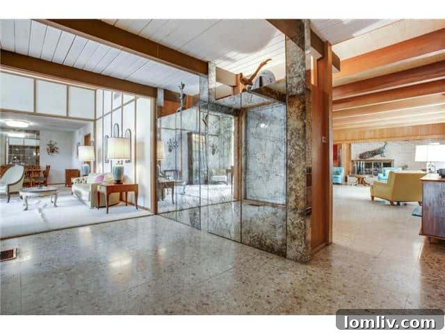 Spacious Foyer Detailing Architectural Lines and Natural Light