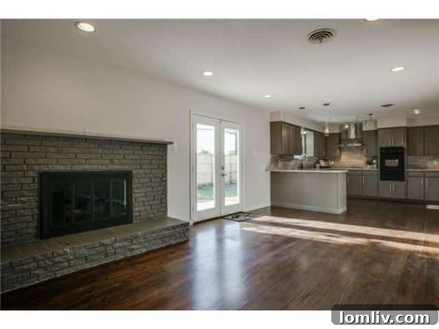 Luxurious kitchen with warm gray-taupe Shaker cabinets and ample counter space