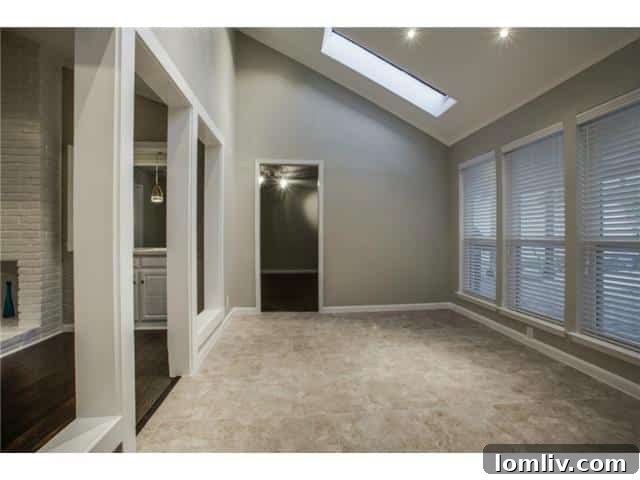 Serene sunroom with abundant natural light and cedar beams at 13016 Fall Manor