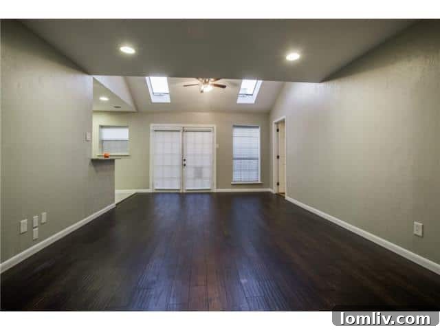 Elegant dining room adjacent to the living area, ideal for entertaining in 13016 Fall Manor