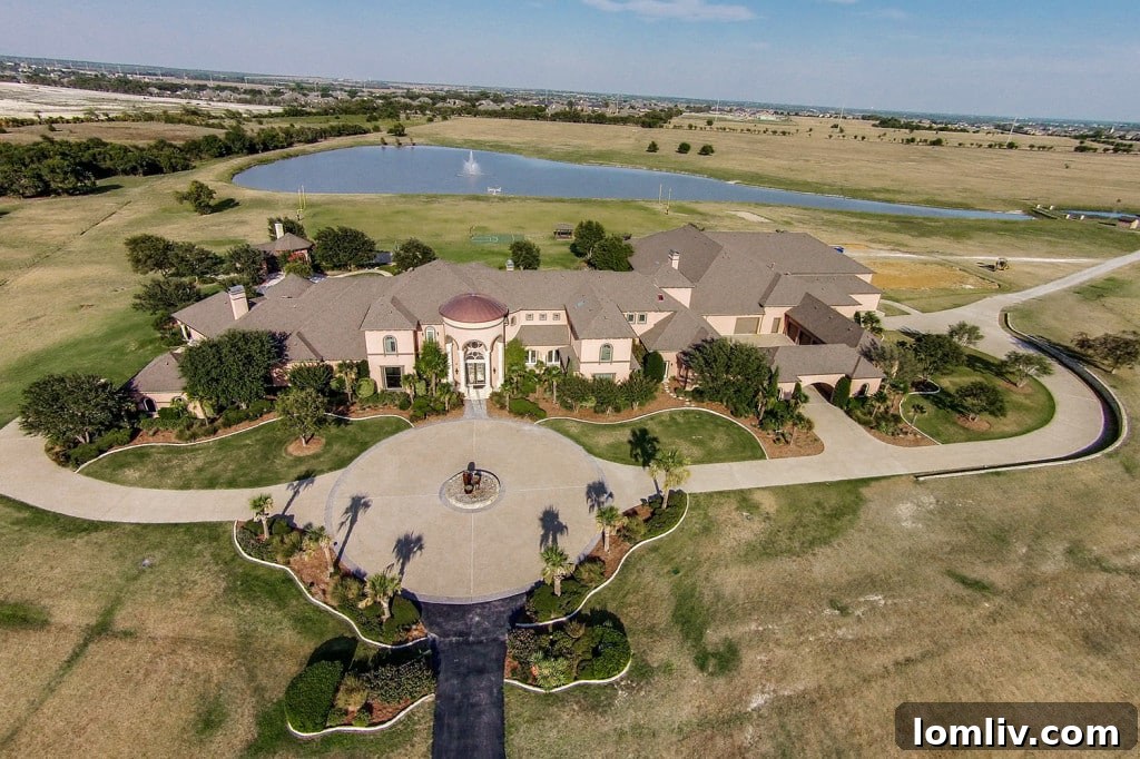 Another angle of the exterior, showcasing the grand entrance and circular driveway.