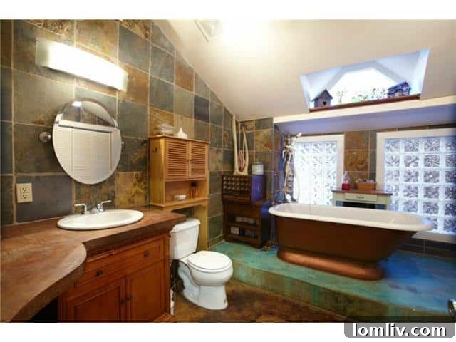 Luxurious Master Bathroom with Soaking Tub and Slate Tile