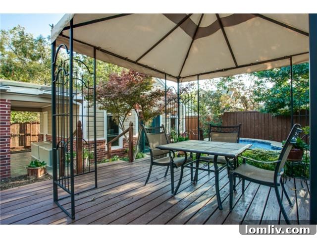 Expansive outdoor deck, ideal for al fresco dining, sunbathing, and entertaining