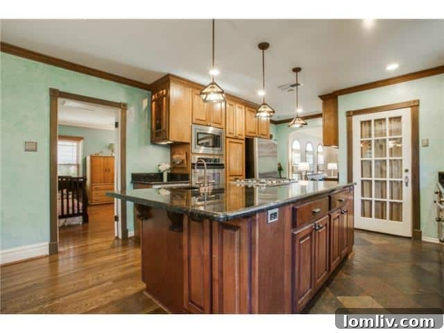 Spacious kitchen view showcasing extensive counter space and a convenient built-in wine cooler