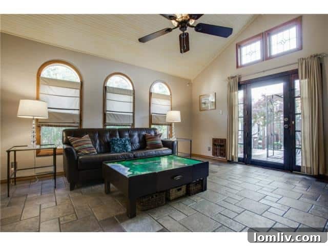 Bright and spacious den interior, emphasizing its connection to the outdoors