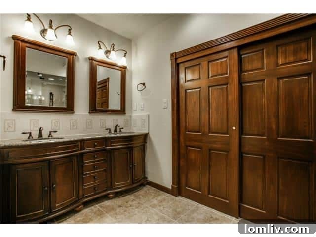 Spa-inspired master bathroom featuring a deep soaking tub and luxurious tile work