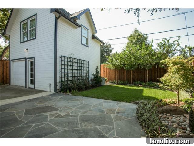 Manicured backyard with lush landscaping and easy access to the charming guest suite