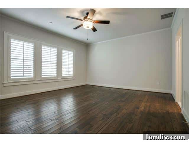 Luxurious upstairs master bedroom with a spacious sitting area and elegant decor