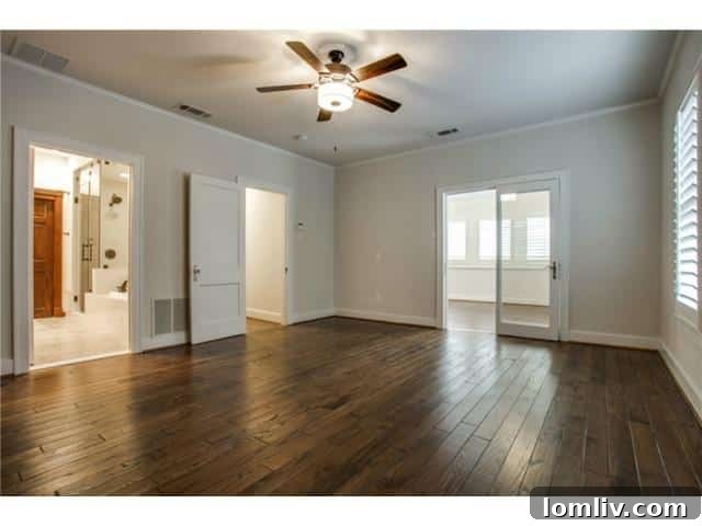 Cozy fireplace and sophisticated details in the main master bedroom suite