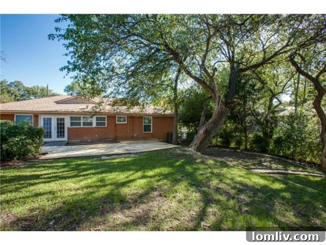 Spacious Wood Deck and Lush Backyard with Mature Trees