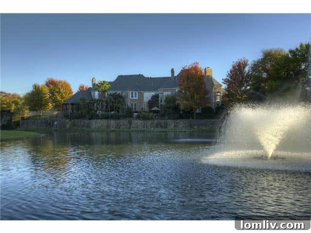 Beautiful fountain feature within the estate's serene pond.