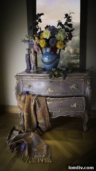 Handwoven wool blanket draped elegantly with a decorative vase, symbolizing warmth and comfort in holiday home decor