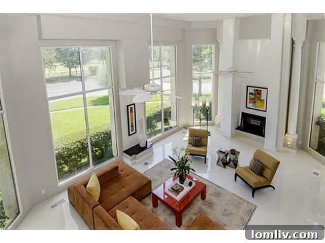 Spacious Living Room with Two-Story Windows