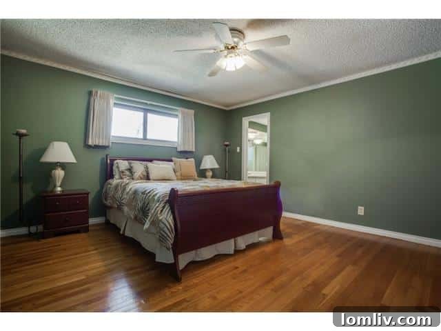 Seeking East Dallas Midcentury Original Hardwoods This Christmas 12 Another generously sized bedroom featuring elegant hardwood flooring and expansive space at 9364 Forest Hills Blvd