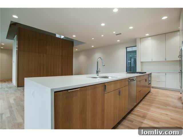 Contemporary Kitchen Island and Workspace at 4112 Cole