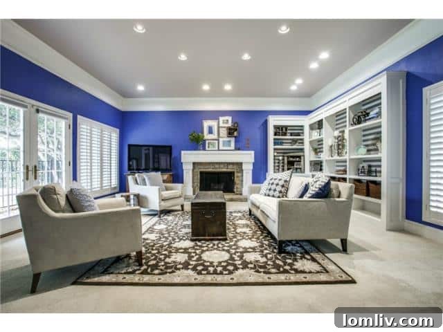 Elegant formal living room featuring a striking royal blue wall