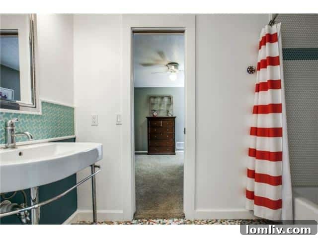 Convenient Jack-and-Jill bathroom with dual sinks