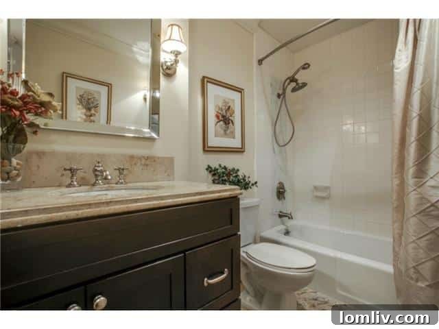 Stunning Views, Incredible Value 11 Athena-unit-1416-Guest-Bath: Elegant guest bathroom.