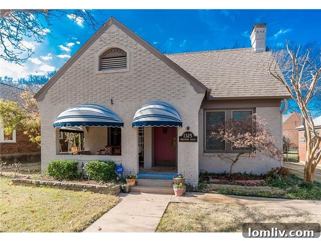 Historic North Oak Cliff Tudor: Stained Glass and Chambers Stove Legacy 2 Exterior front view of 1325 Hollywood Ave, a charming Tudor home in Dallas's Hampton Hills neighborhood