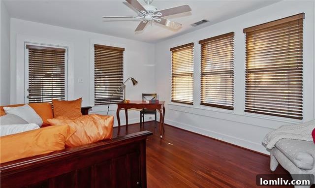 Historic North Oak Cliff Tudor: Stained Glass and Chambers Stove Legacy 16 Inviting second bedroom in 1325 Hollywood Ave, featuring bright natural light and ample space