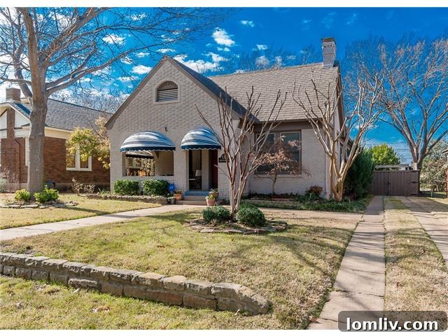 Historic North Oak Cliff Tudor: Stained Glass and Chambers Stove Legacy 3 Detailed front view of the 1325 Hollywood Ave Tudor home, highlighting its distinctive English Cottage architectural style
