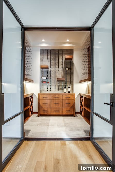 Dallas Home Builder Tatum Brown Earns Best of Houzz 4 Elegant custom wet bar with intricate detailing and modern lighting in a luxury Dallas home