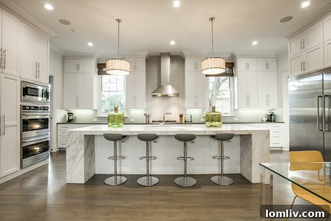 Dallas Home Builder Tatum Brown Earns Best of Houzz 5 Open-concept luxury kitchen and living area with contemporary design and natural light in a Dallas home