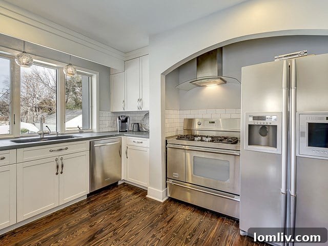 Modern remodeled kitchen with high-end stainless steel appliances and generous counter space