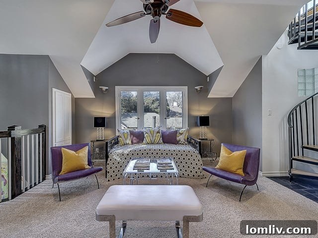 Another perspective of the cozy den, showing built-in features and abundant natural light