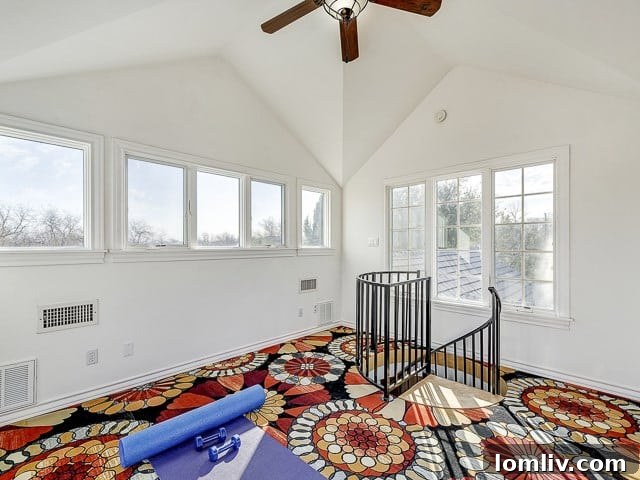 Versatile third-floor loft space with stunning city views, ideal for a home office, art studio, or guest retreat