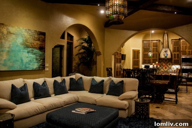 Spacious dining area with unique lighting and contemporary decor, a Russell Ross signature design for elegant entertaining.