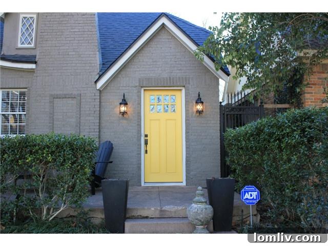 Clinton Street's Irresistible Charm: Prepare to Break Up With Your Old Home 3 Charming Yellow Front Door of 1110 N Clinton Tudor Home
