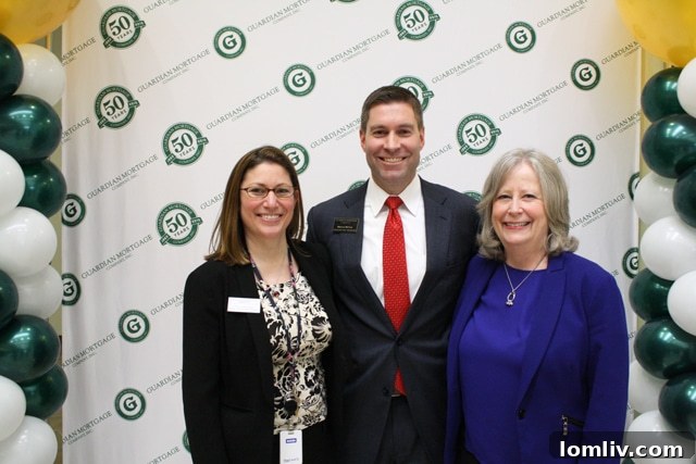 Cari and Marcus McCue with Marcia Phillips, CEO of Guardian Mortgage