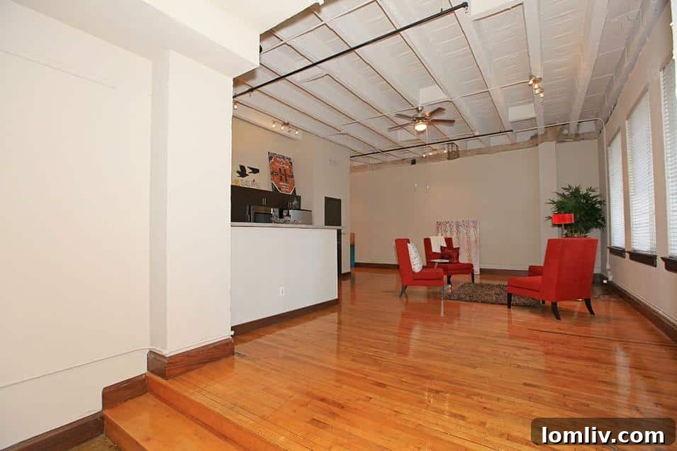 Interior of a Kirby Residences loft with hardwood floors and high ceilings.