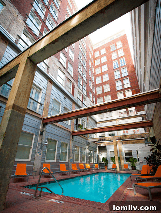 Outdoor swimming pool and lounge area at the Interurban Building.