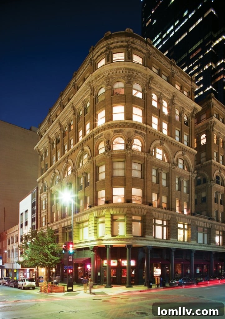 The historic Wilson building at night on Main Street, Dallas.