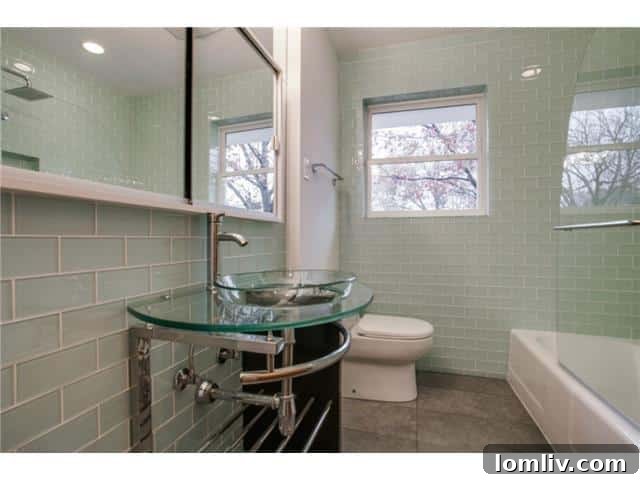 Sleek Modern Remodel in Lochwood 14 Second Bathroom with Subway Tile
