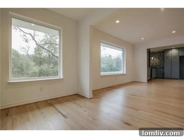 Sleek Modern Remodel in Lochwood 6 Modern Kitchen and Living Space at 11666 Saxon