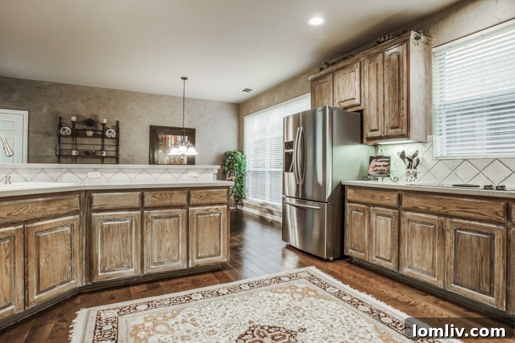 A bright and spacious bathroom, featuring modern fixtures and finishes.