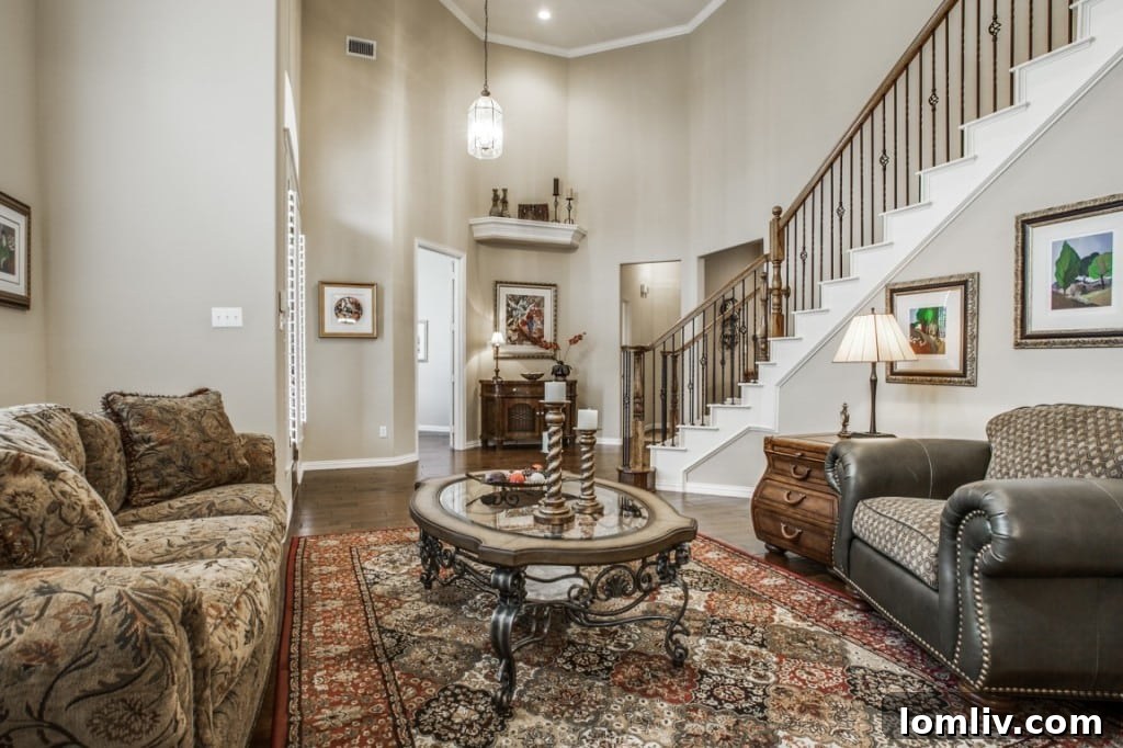 Another view of the elegant living area, showing open-concept flow and refined finishes.