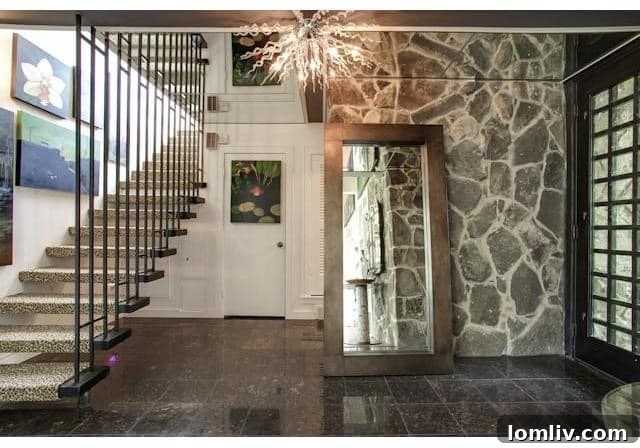 5320 Quail Run Street - Elegant Entryway with Suspended Staircase