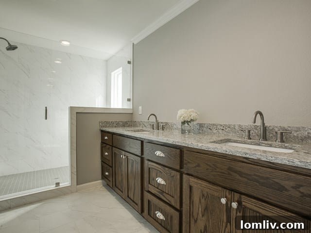 The Remodeled Ranch Driving Midway Hollow's Boom 13 Luxurious Master Bathroom with Double Vanity