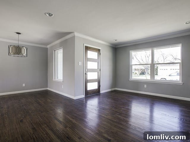 The Remodeled Ranch Driving Midway Hollow's Boom 4 Elegant Foyer and Entryway at 4050 Valley Ridge