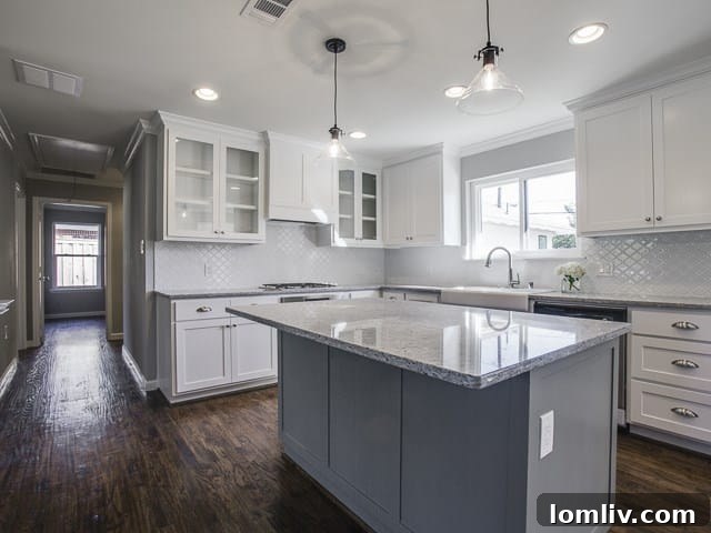 The Remodeled Ranch Driving Midway Hollow's Boom 8 Modern Kitchen with Slate Blue Island