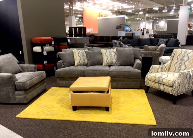 Nebraska Furniture Mart of Texas entrance with bloggers during a sneak peek event, showcasing its vast selection of home furnishings, appliances, and decor.