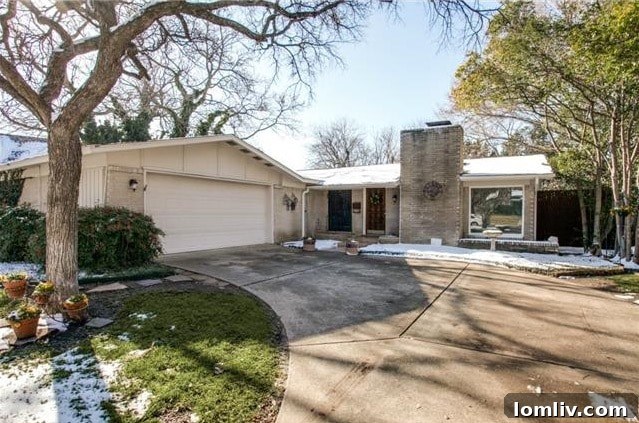 Welcoming Front Entryway of 3714 Crown Shore Dr, Dallas with Mature Landscaping